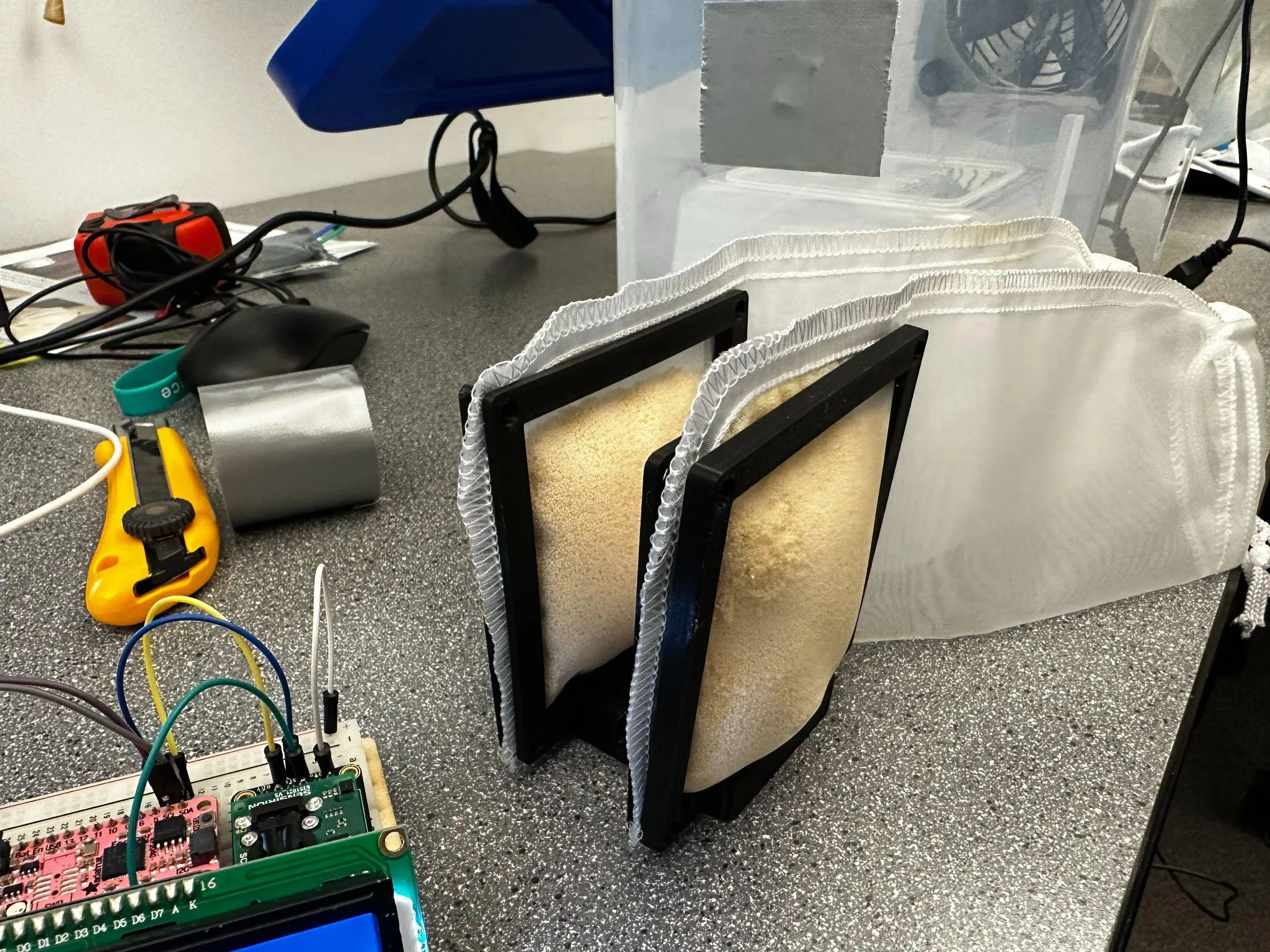 A photograph of sorbent holder trials. Taken by a UREC team member, used under fair-use.
