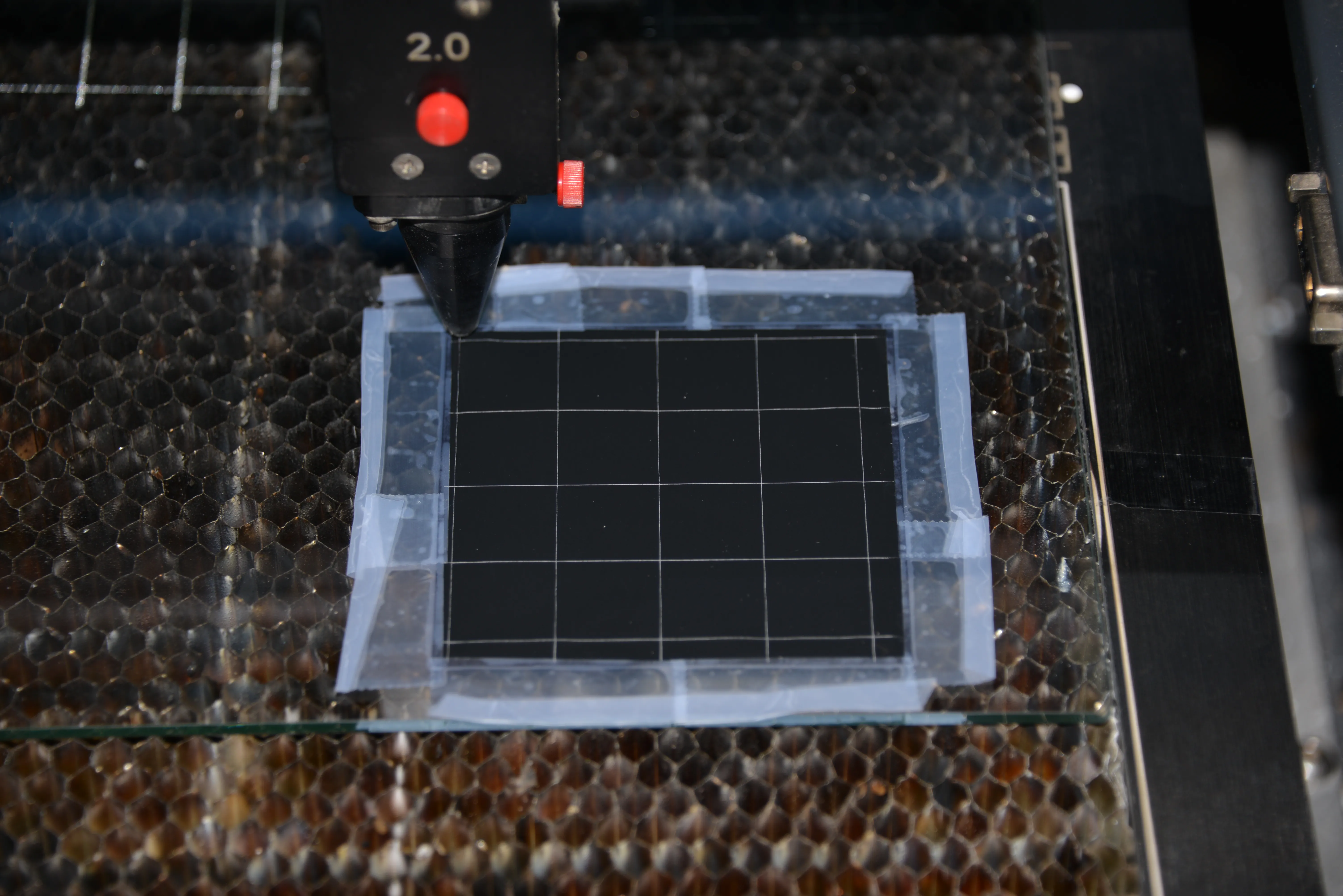 A photograph of fuel cell catalyst coated membrane laser segmentation trials. By Maximilian Schwager.