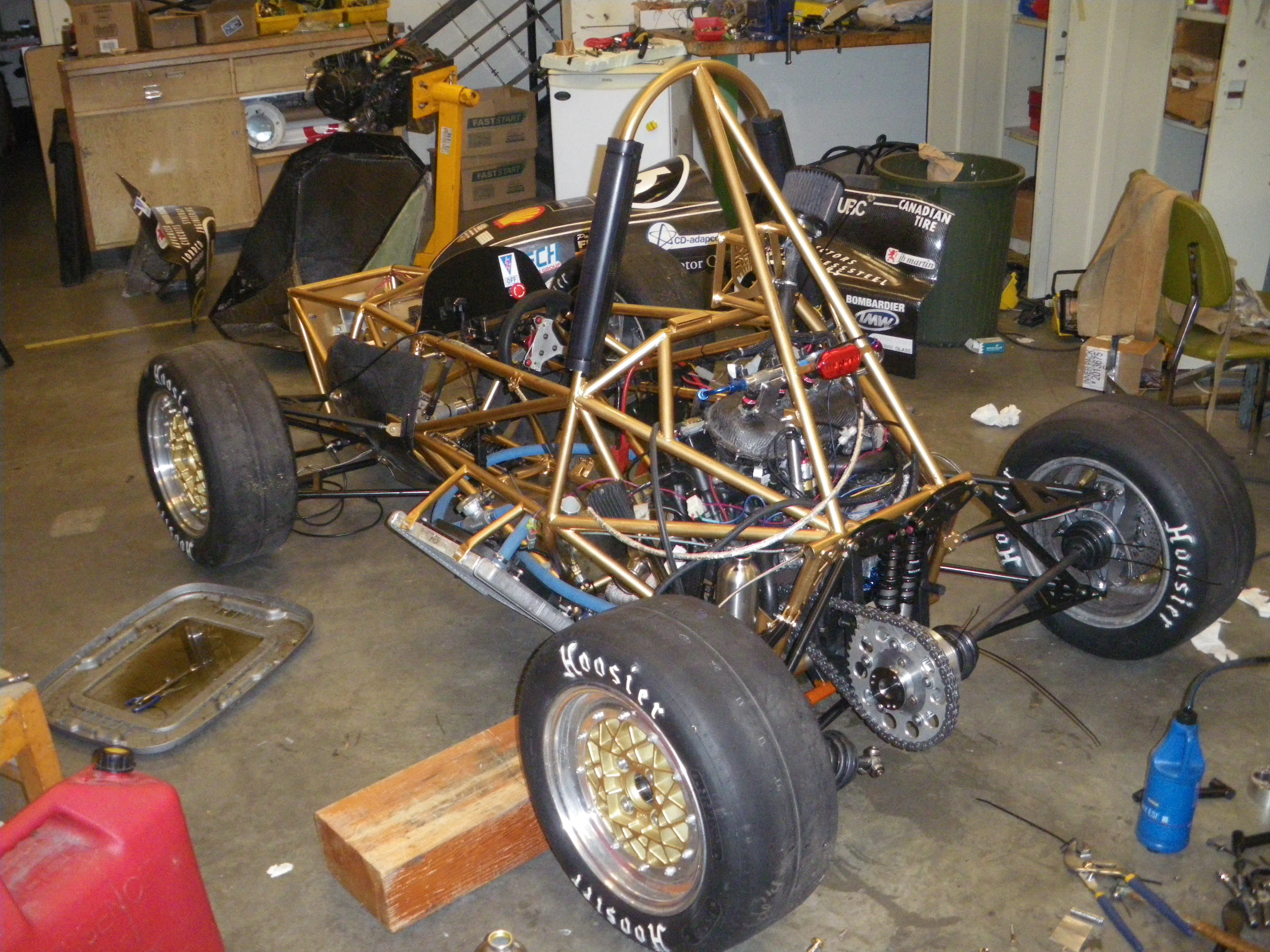 A photograph of the #16 FSAE car partially disassembled. Taken by a Formula UBC team member, used under fair-use.