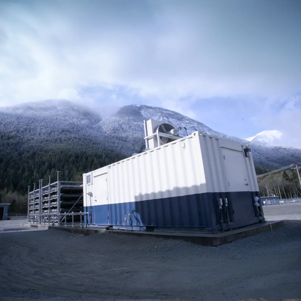 A photograph of the Hydrogen Assisted Renewable Power (HARP) Project in British Columbia. Adapted under fair-use from photograph by Powertech Labs.